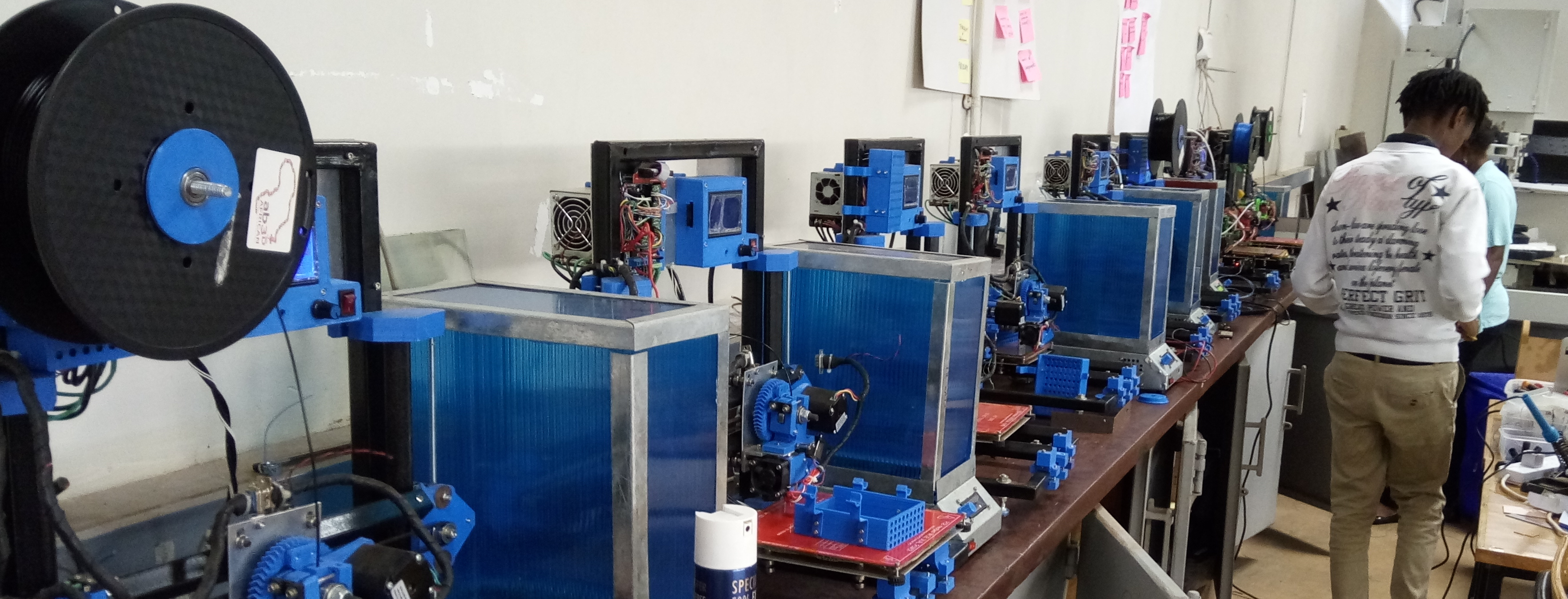 A farm of locally made 3D printers in Nairobi, Kenya. (c) Julian Stirling 2018. License CC-BY Local production with 3D printers in Kenya